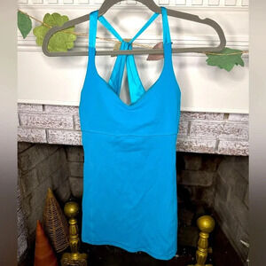 Lululemon Surge tank size 6 teal crossover back with satin like ribbon